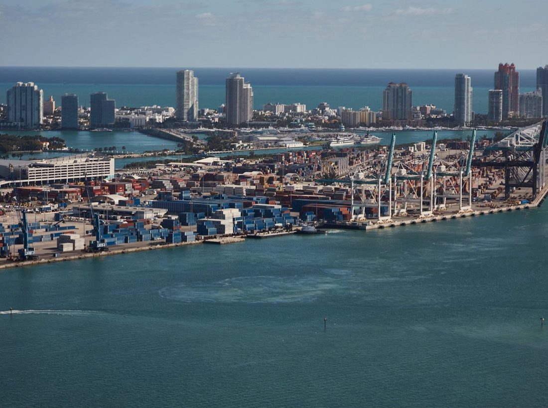 Aerial view of a working container port and its terminal cranes